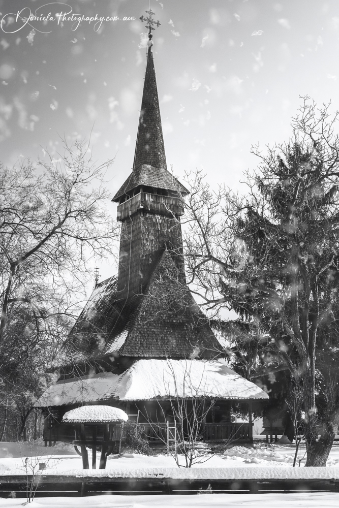 Traditional Romanian Wooden Church in winter BW